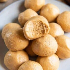 peanut butter balls with a bite out of it