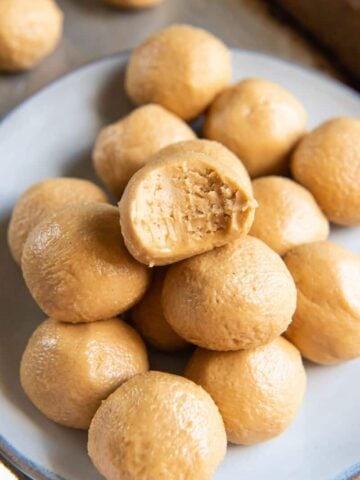 peanut butter balls with a bite out of it
