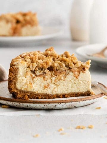 apple crumble cheesecake on a plate