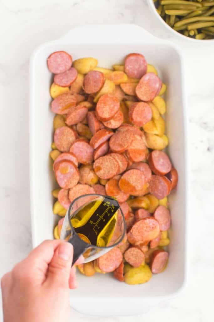 drizzling potatoes with olive oil