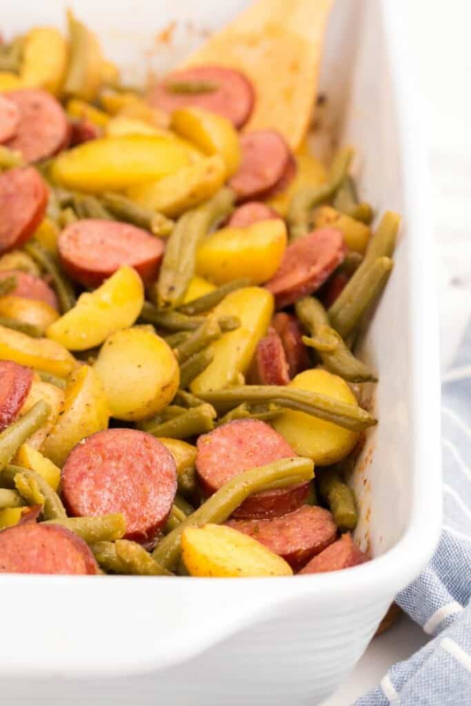 closeup of casserole dish with sausage green bean potato casserole