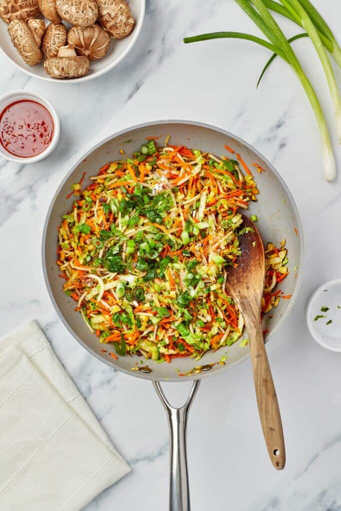 bowl with spring rolls filling