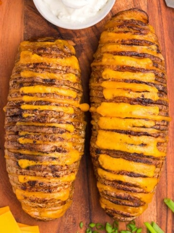 melted cheese in hasselback potatoes