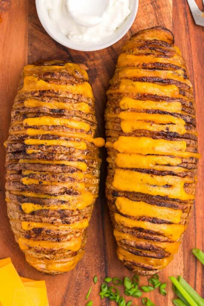 melted cheese in hasselback potatoes