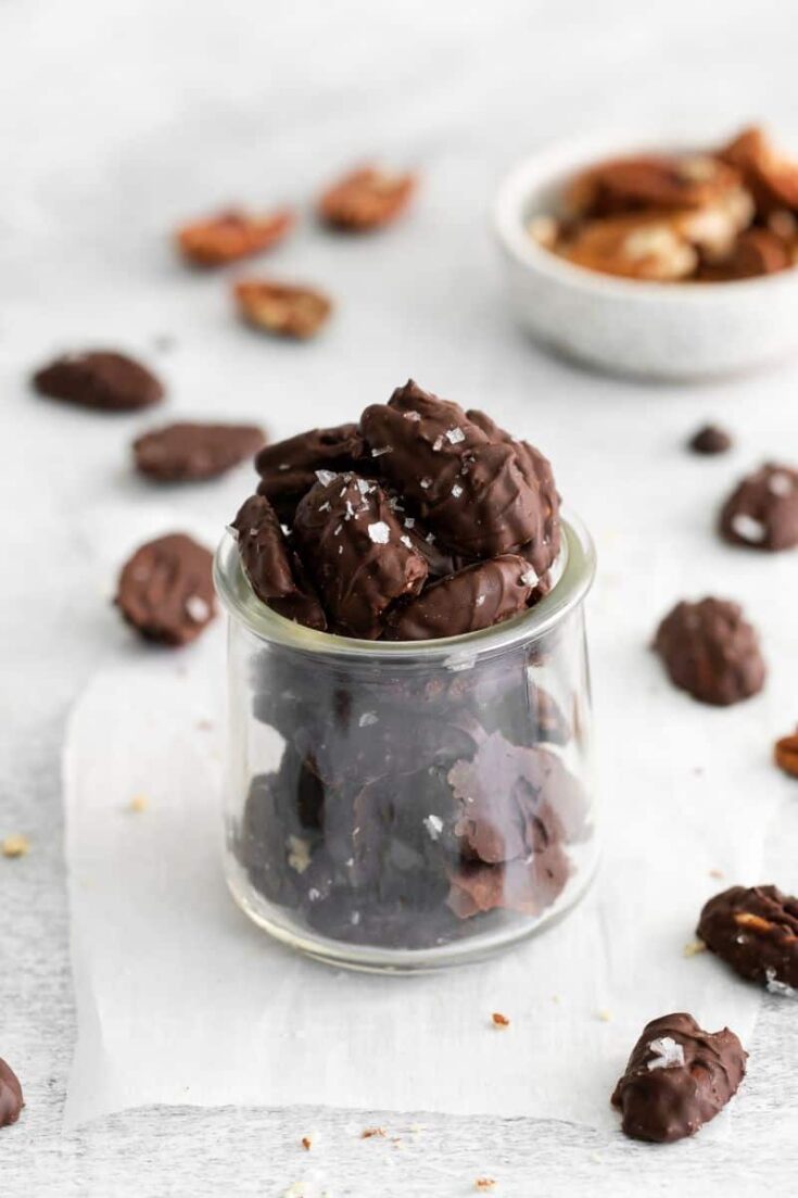 jar filled with chocolate covered pecans