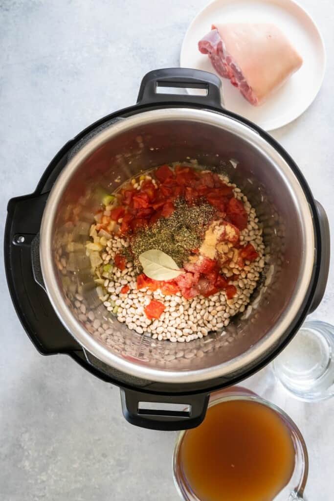 adding spices and seasonings to instant pot