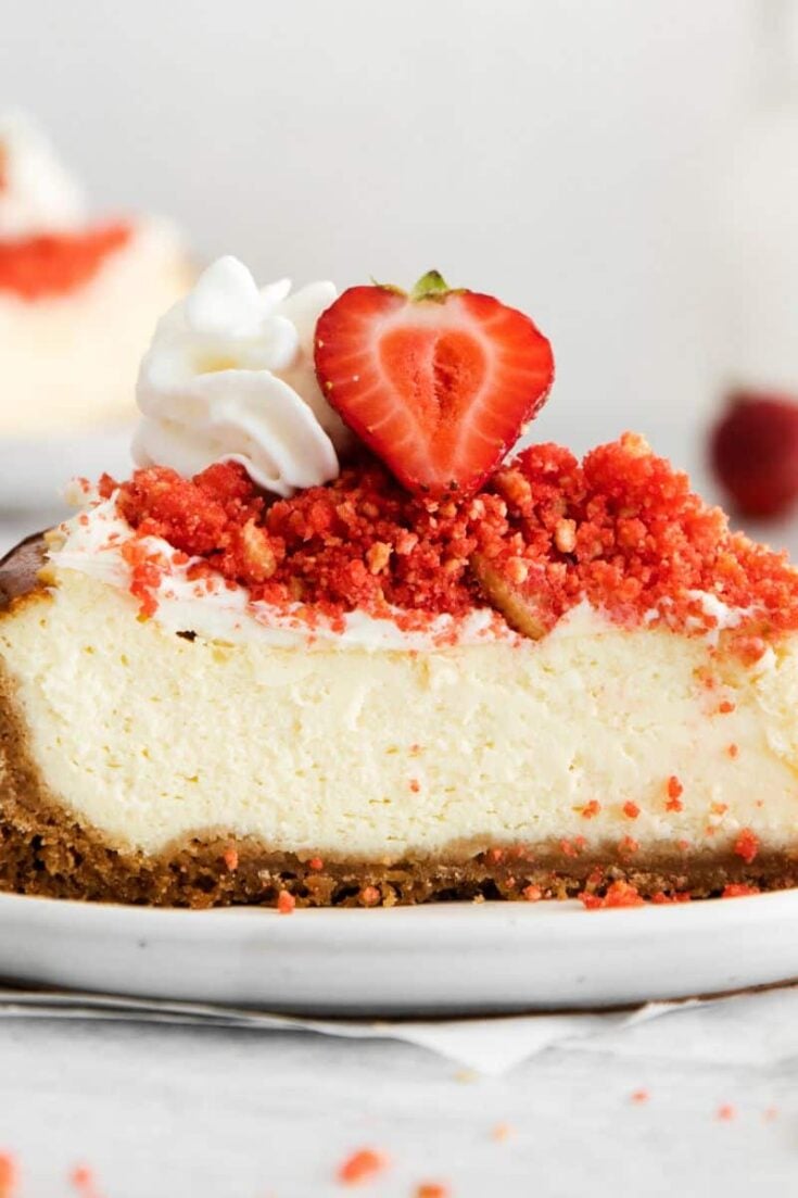 strawberry crunch cheesecake on a plate
