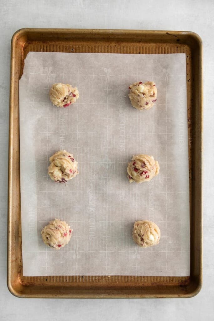 balls of white chocolate raspberry cookie batter