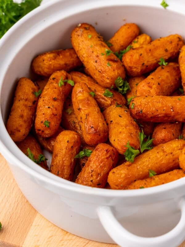 air fried baby carrots in white bowl