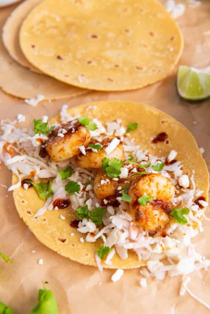 open shrimp taco with ingredients