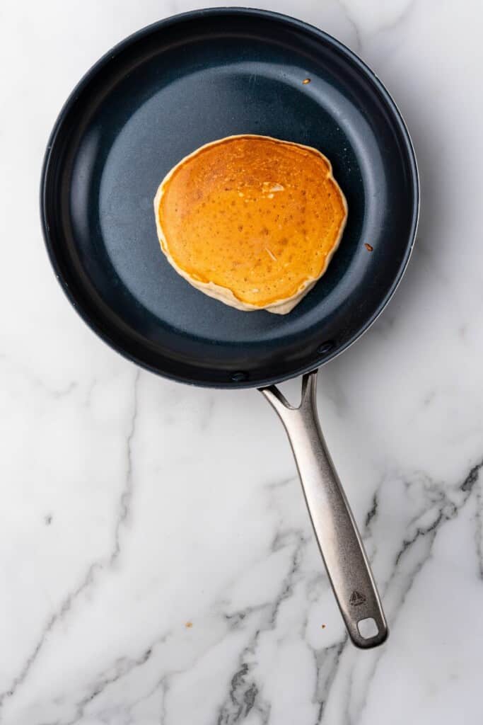 golden brown pancake in skillet