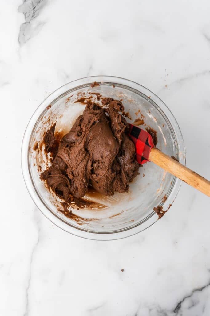 brownie crinkle cookie batter in bowl