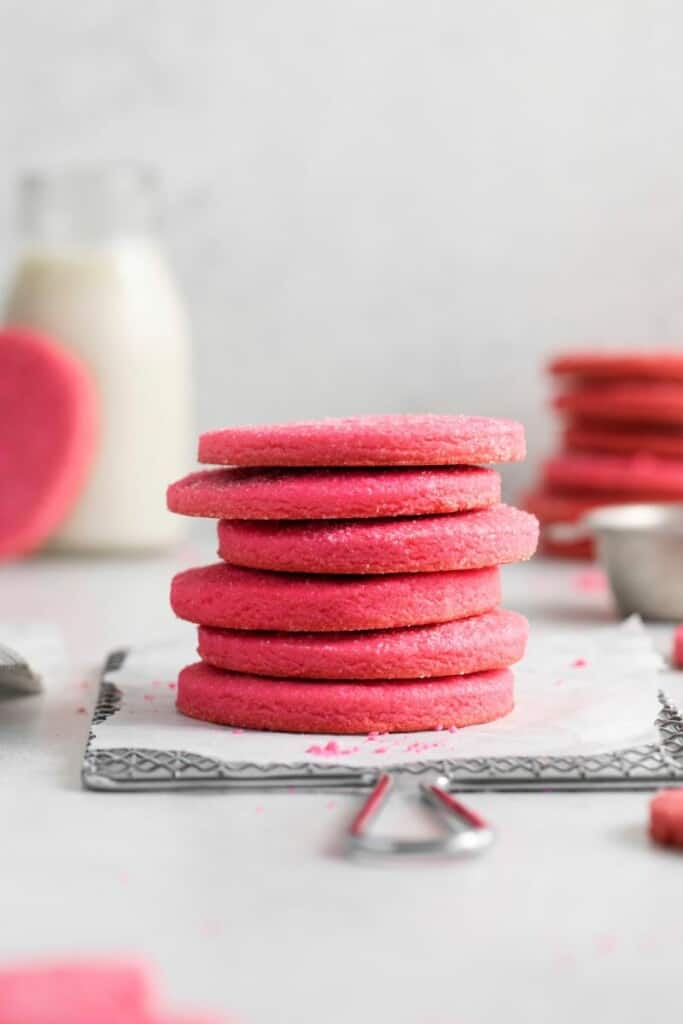 stack of pink sugar cookies