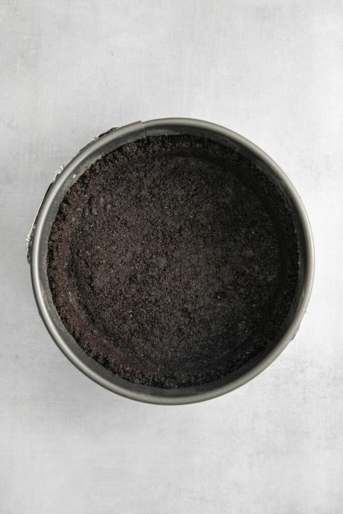 Oreo crust in a springform pan