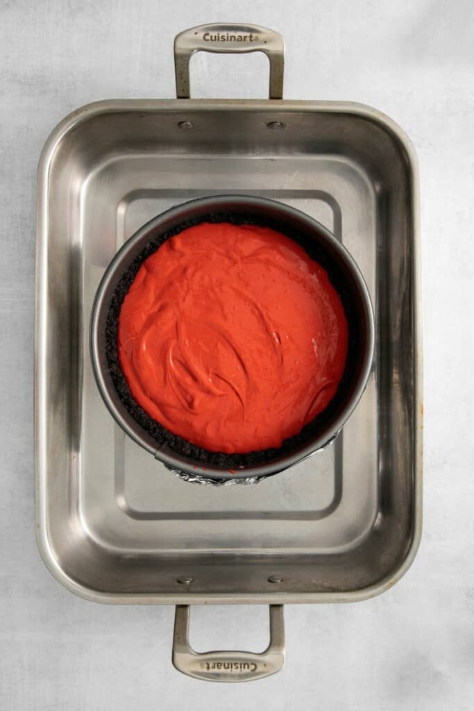 Red Velvet Cheesecake in a hot bath pan for baking