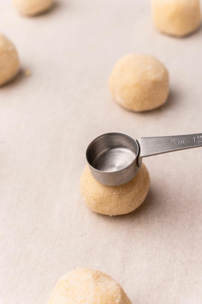 forming holes in the center of the cookie dough