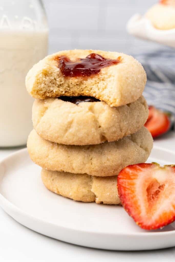 strawberry jam cookie with bite out of it