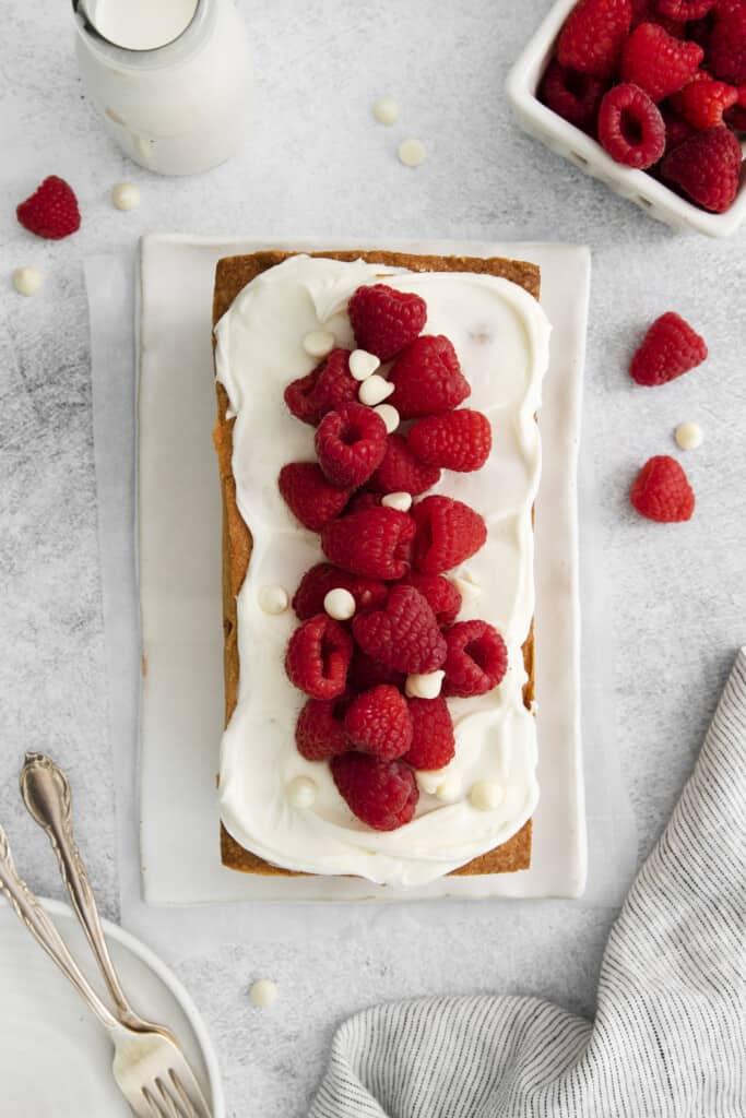 loaf cake with fresh raspberries