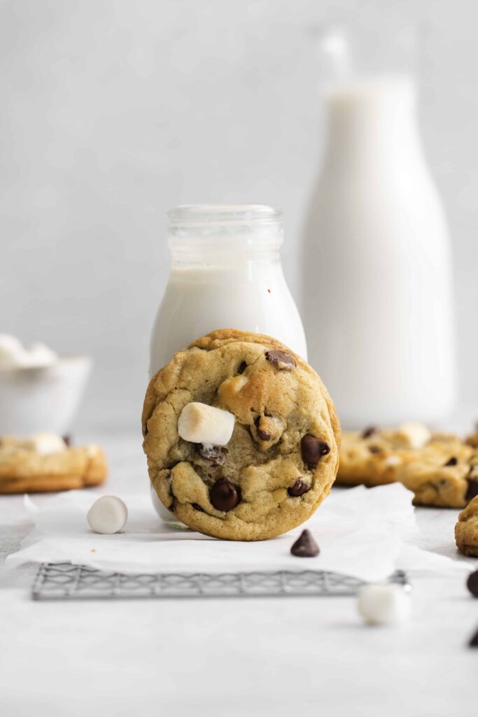 cookie propped against milk