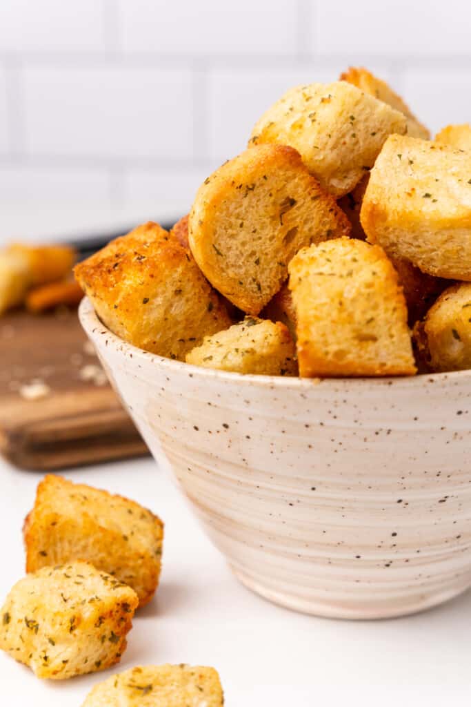 side view of croutons in a bowl