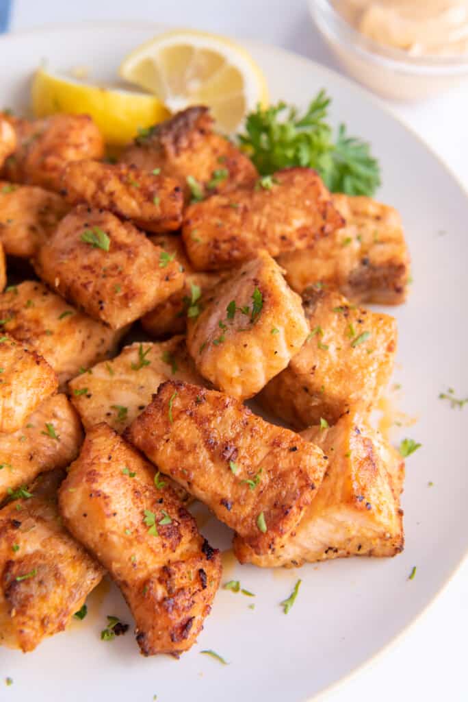 healthy salmon bites on a white plate