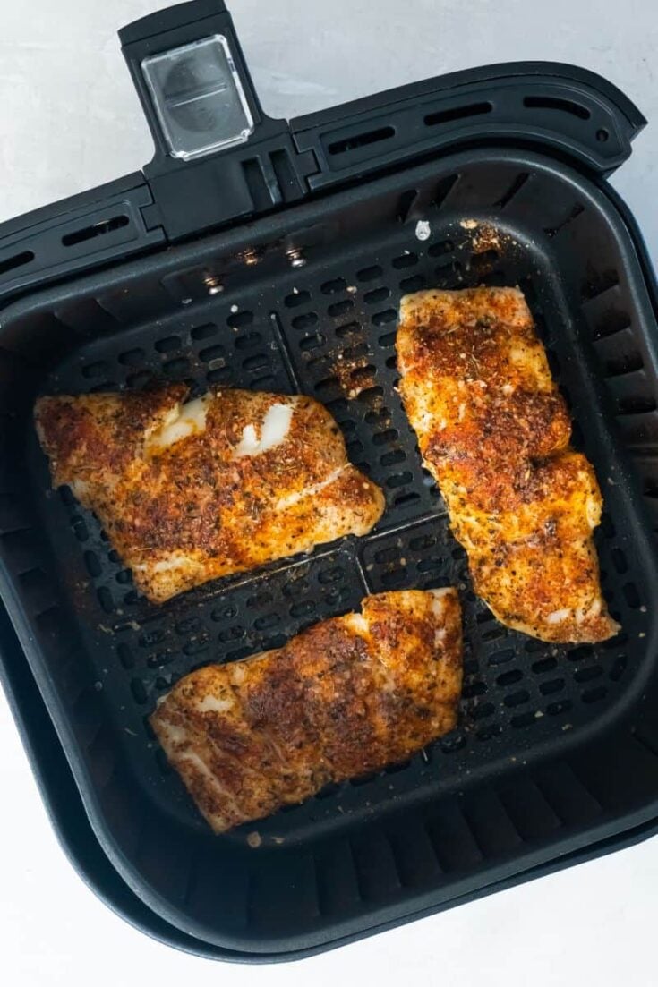 air fryer with cooked haddock