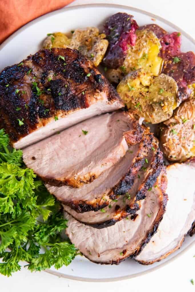 sliced pork roast on a platter