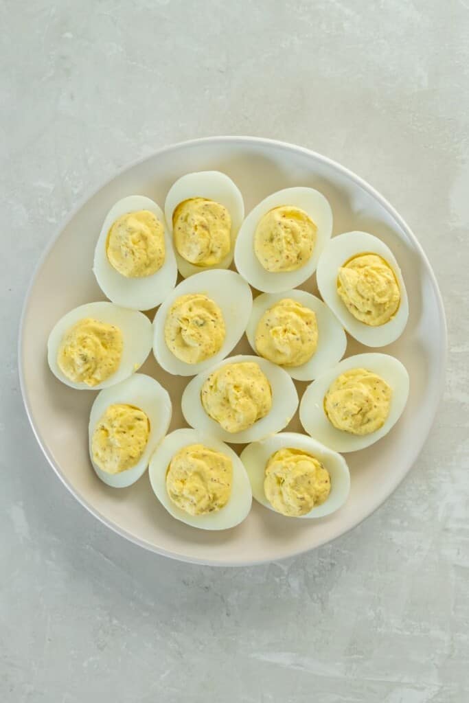 filled deviled eggs on platter