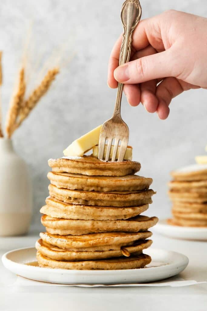 cutting pancakes with a fork