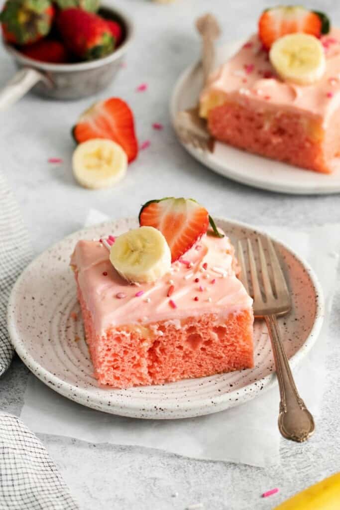 slice of strawberry banana cake on a plate