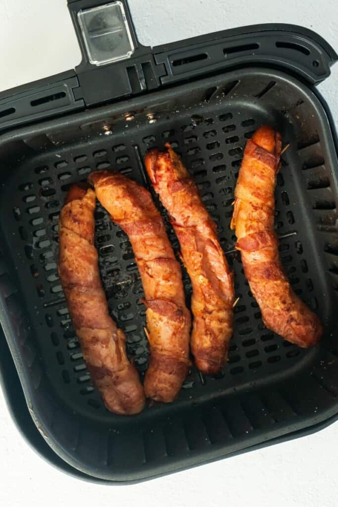 cooked bacon wrapped hot dogs