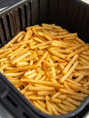 air fryer basket with french fries