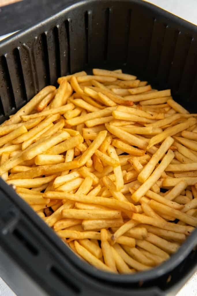 air fryer basket with french fries
