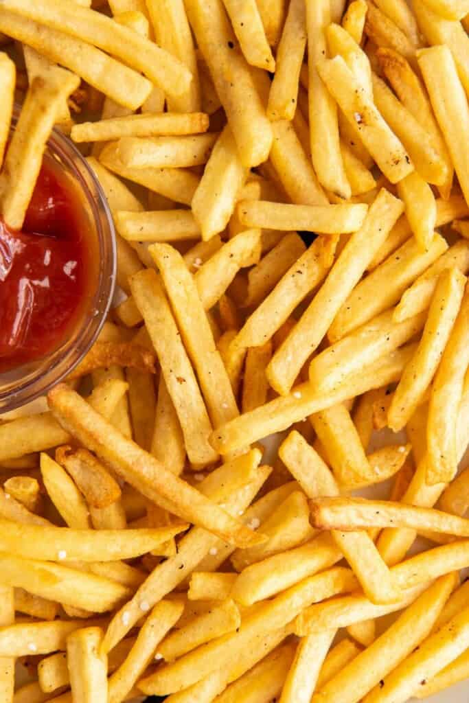 ketchup and fries on a platter