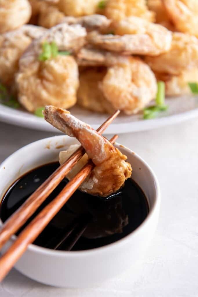 shrimp being held by chopstick