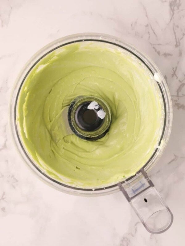 Avocado crema smoothed inside a food processor