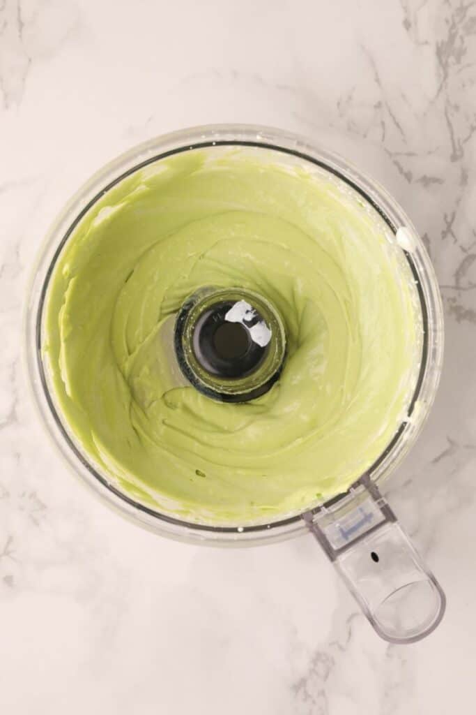 Avocado crema smoothed inside a food processor