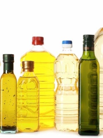 Bottles of different kinds of cooking oil in packaging