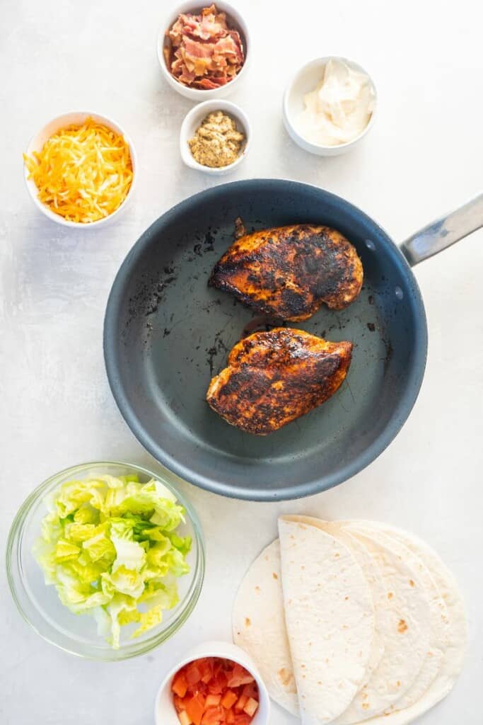 cooking chicken in a skillet