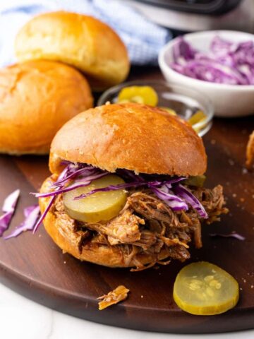 bun with pulled pork and toppings