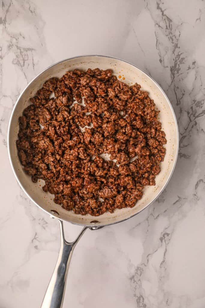 Ground beef being cooked in a pan