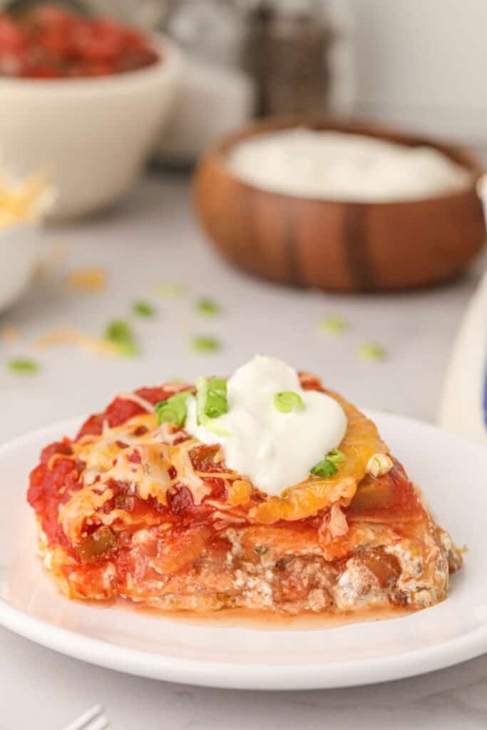 Slice of taco lasagna recipe on a plate