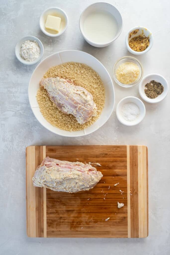 coating chicken in breading