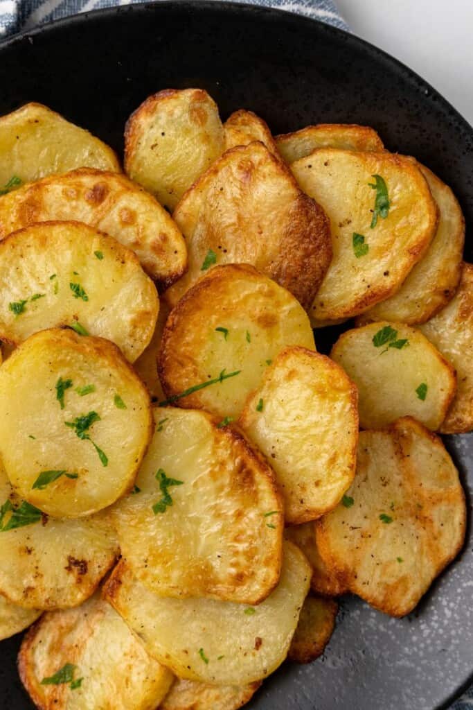 closeup of air fryer sliced potatoes