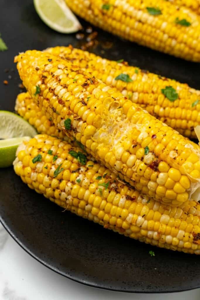 cajun corn with a bite out of it