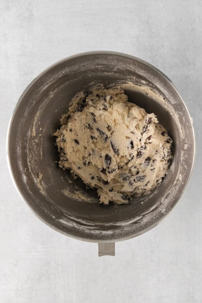 Oreo cream cheese cookies batter in a mixing bowl.