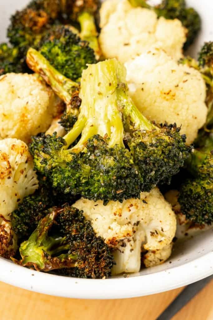 Air Fried Broccoli and Cauliflower in a white bowl.