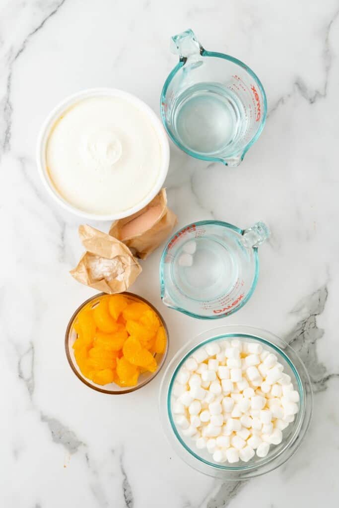 Overhead view of the ingredients required to make an Orange Dreamsicle Salad.