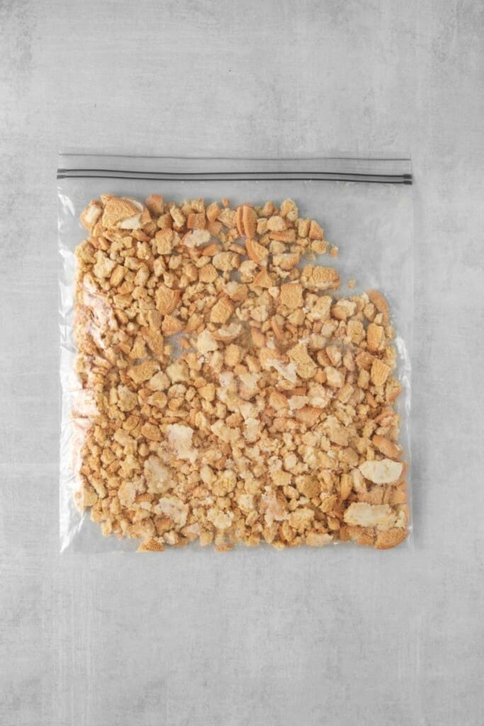 Golden oreos crushed in a ziplock bag.