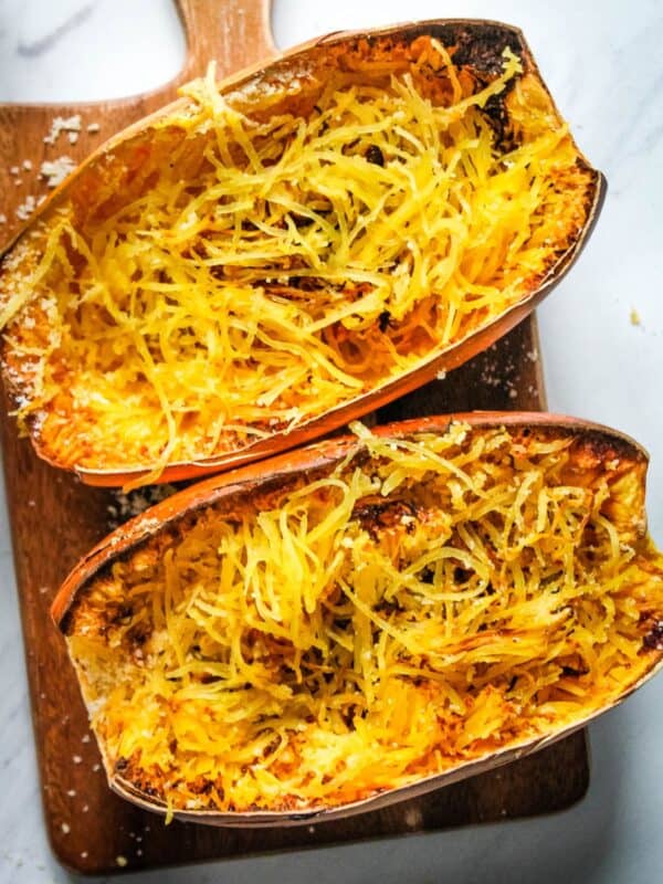 Overhead view of air fryer spaghetti squash with strands mixed in.